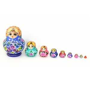 Nine Piece Set Hand Painted Wooden Nesting Dolls
